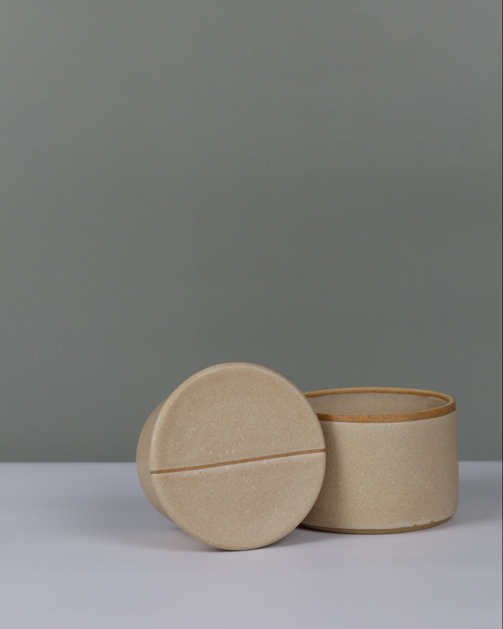 beige butter bell on a grey background