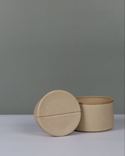 beige butter bell on a grey background