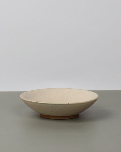 ceramic dish on a grey table