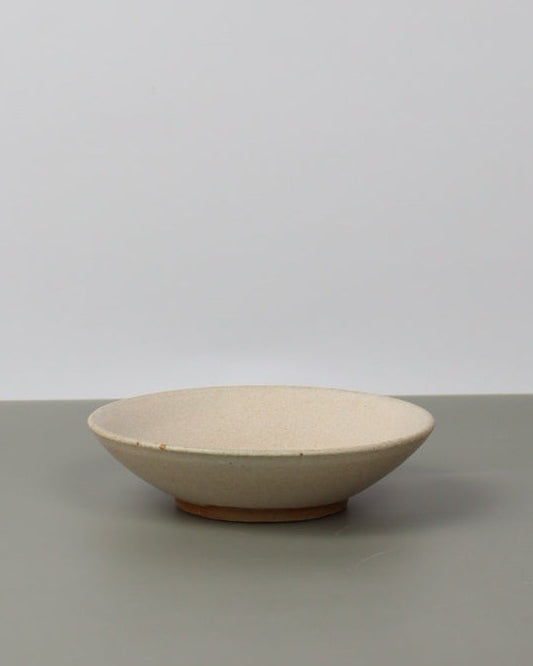 ceramic dish on a grey table