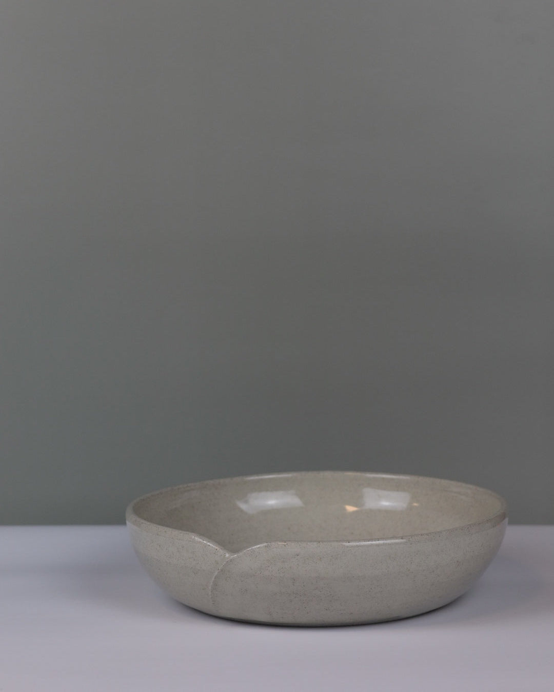Ceramic bowl on a gray background