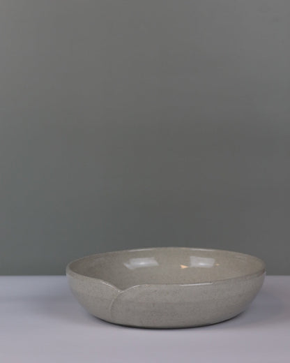 Ceramic bowl on a gray background