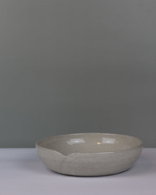 Ceramic bowl on a gray background