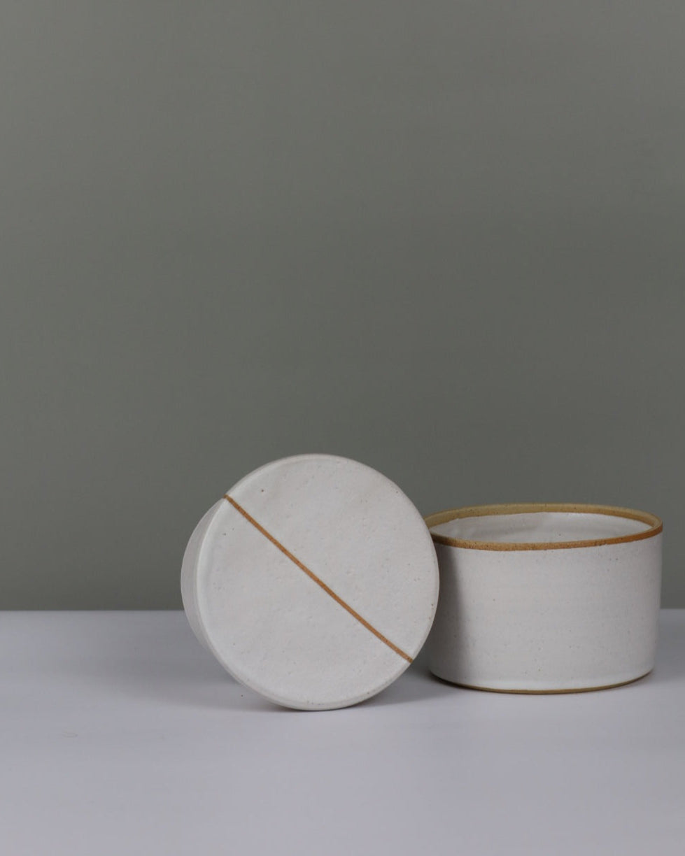white butter bell on a grey background